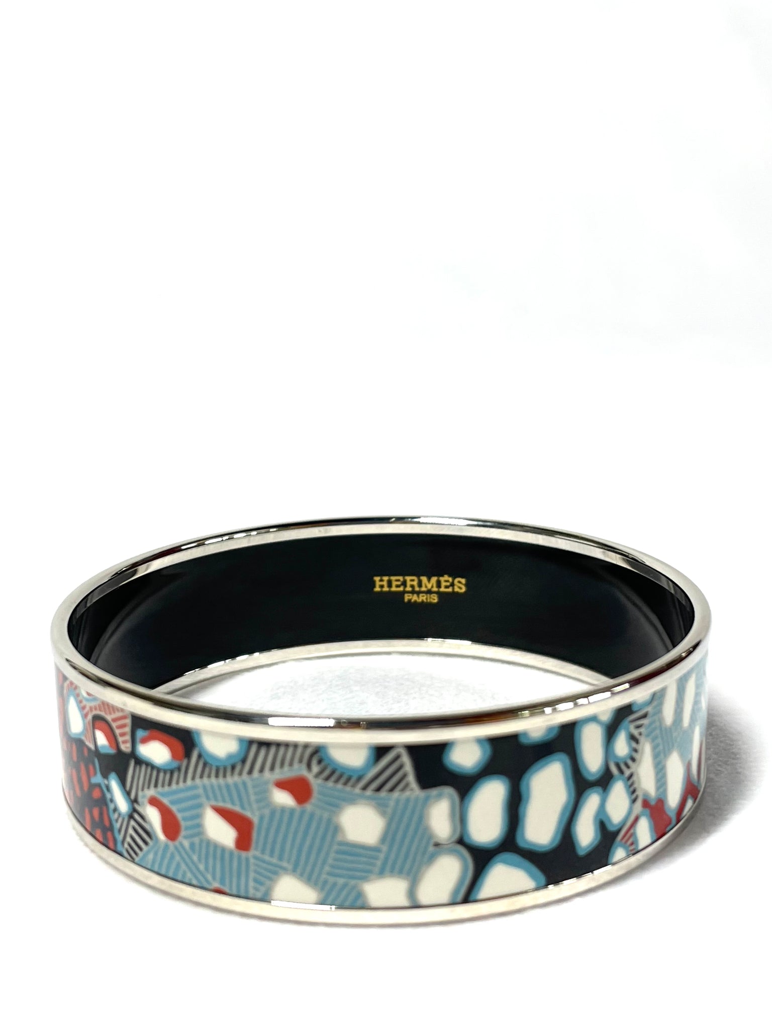 Pre Loved Hermes Animal Print Bangle in Silver available at UniKoncept in Waterloo