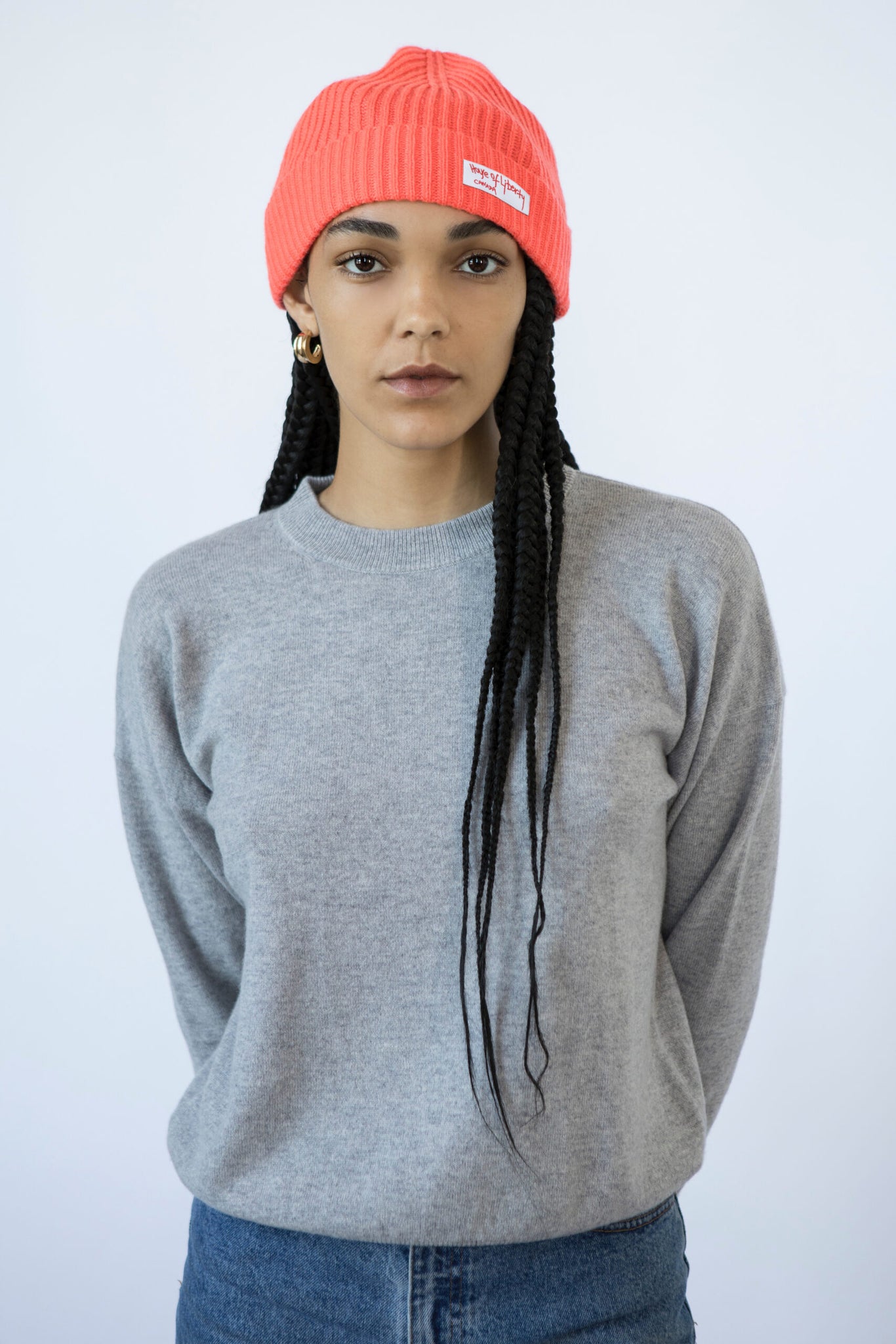 UNIKONCEPT Lifestyle Boutique and Lounge; House of Liberty Cashmere Roxy Ribbed Beanie in colour Chili featured on a model