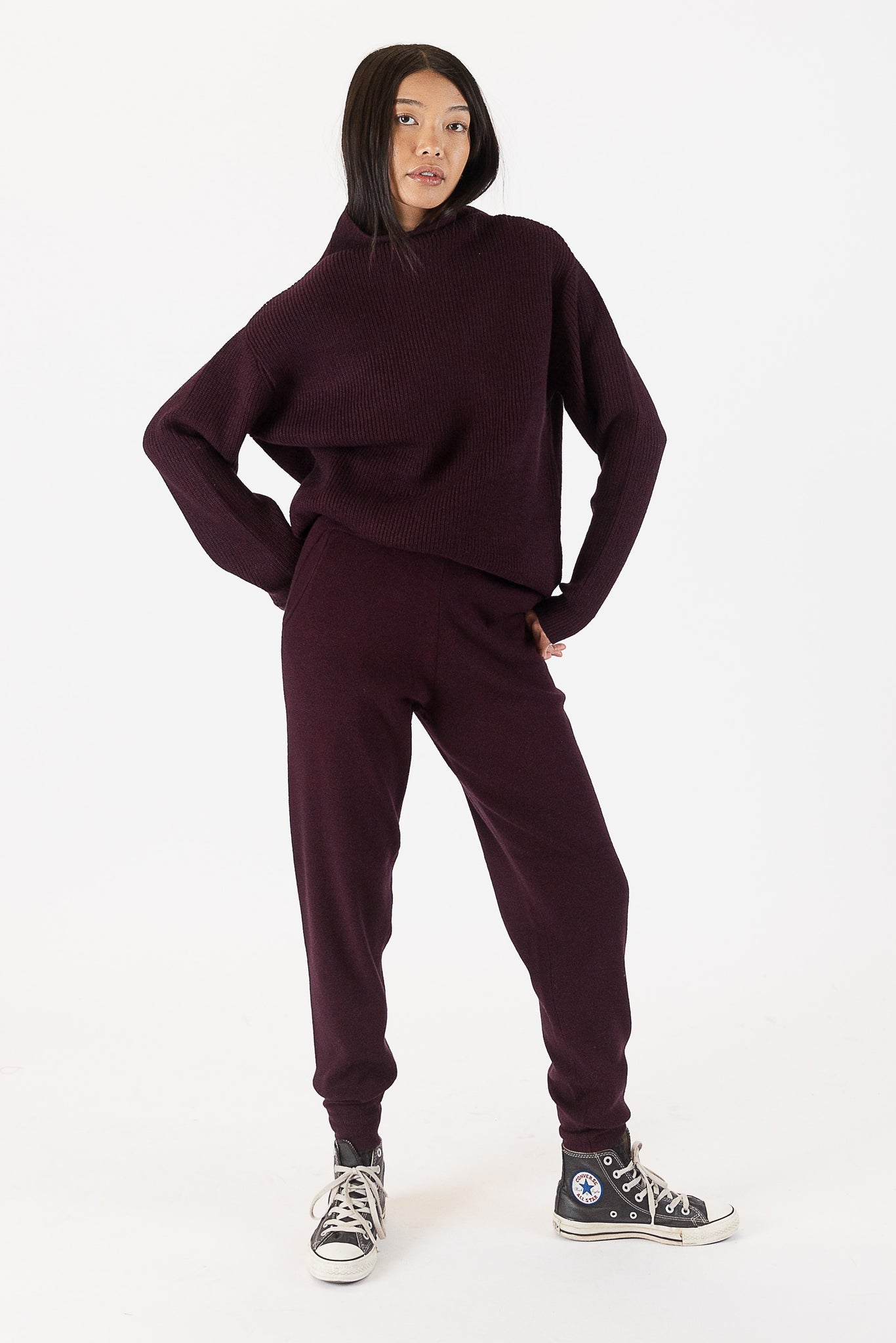 photo of model wearing chadwick ribbed mockneck sweater in a Burgundy colour available at UniKoncept in Waterloo front view