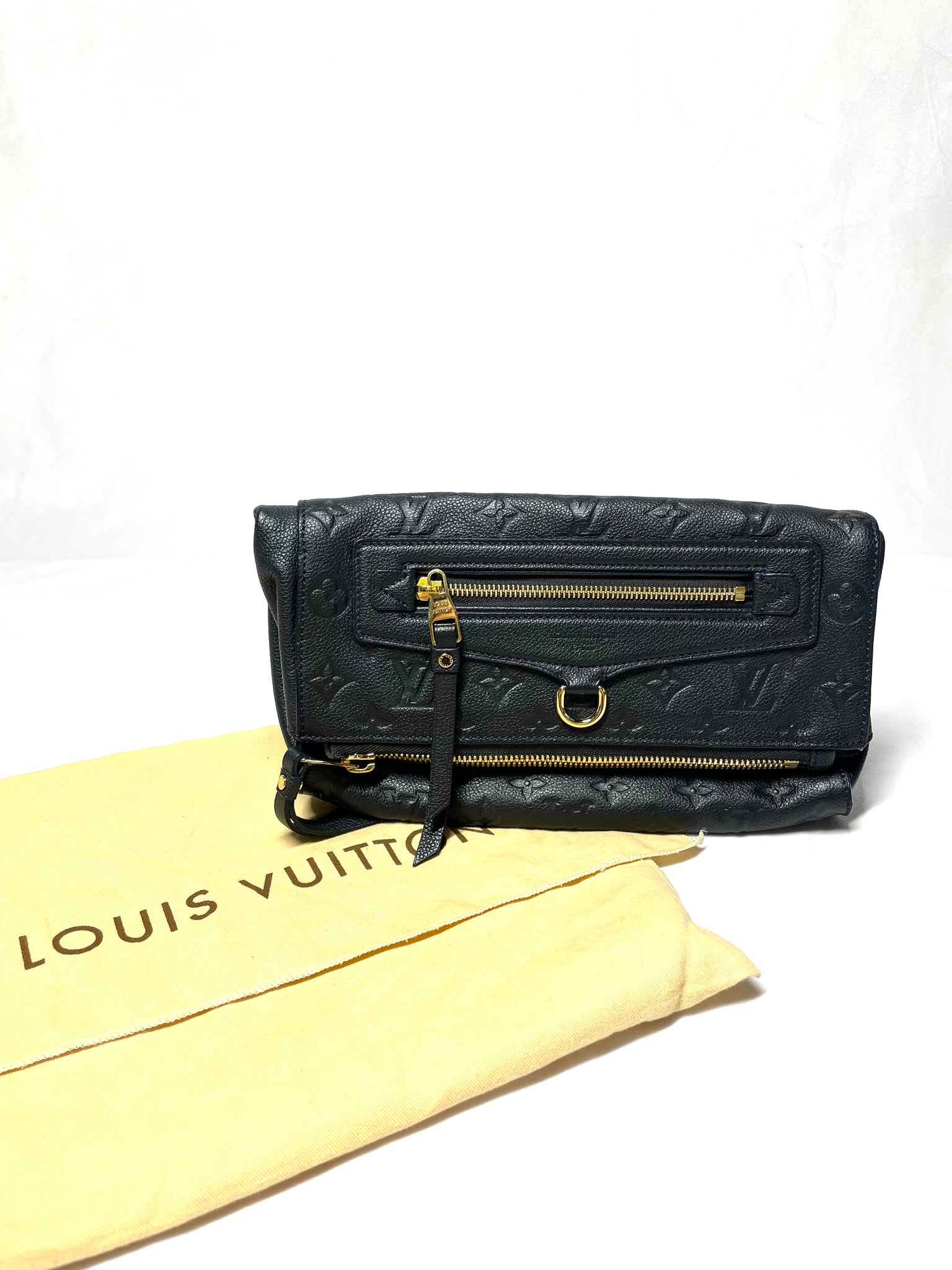 Pre Loved Louis Vuitton Monogram Empreinte Petillante Clutch in Black available at UniKoncept in Waterloo