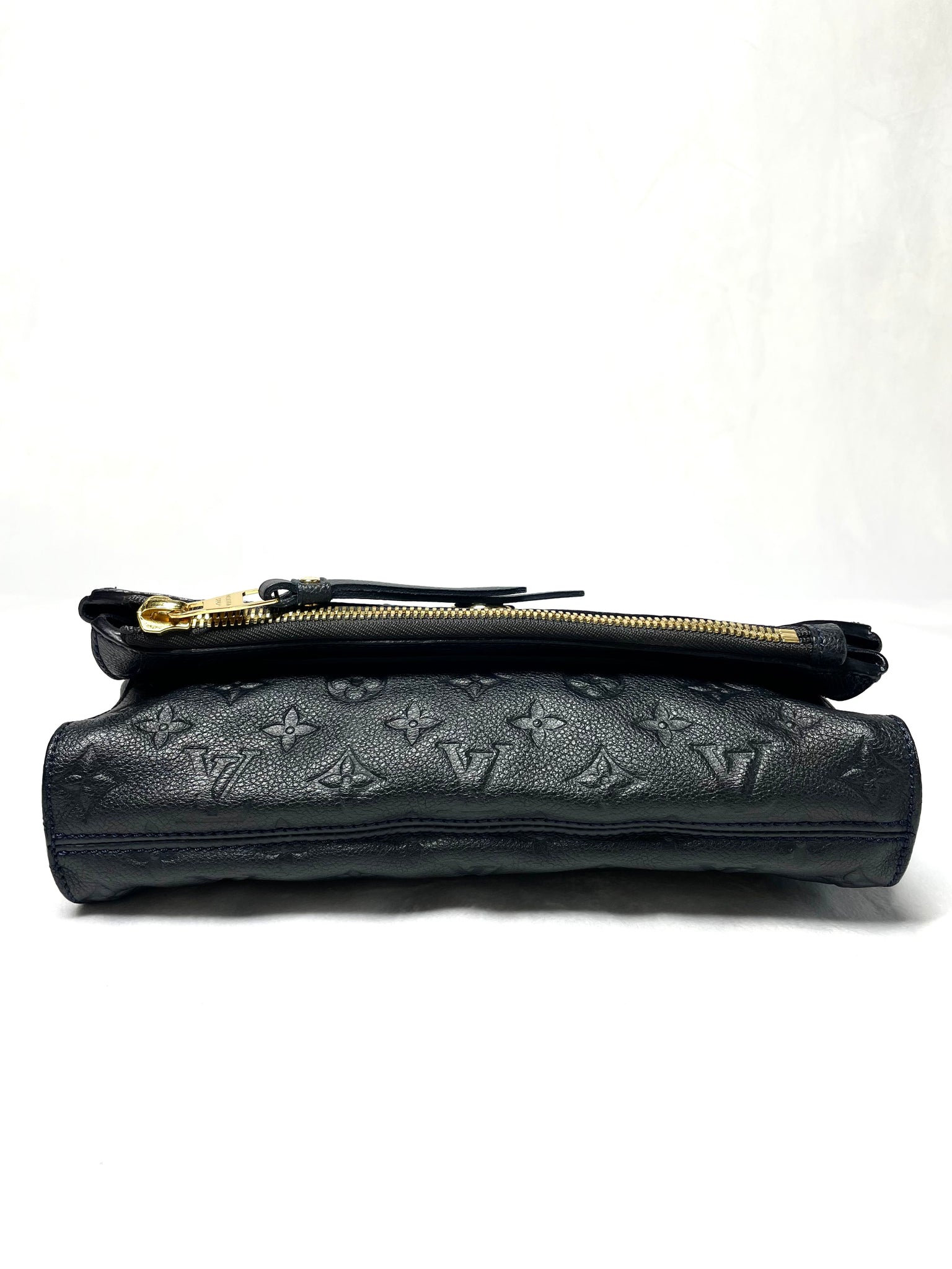 Pre Loved Louis Vuitton Monogram Empreinte Petillante Clutch in Black available at UniKoncept in Waterloo