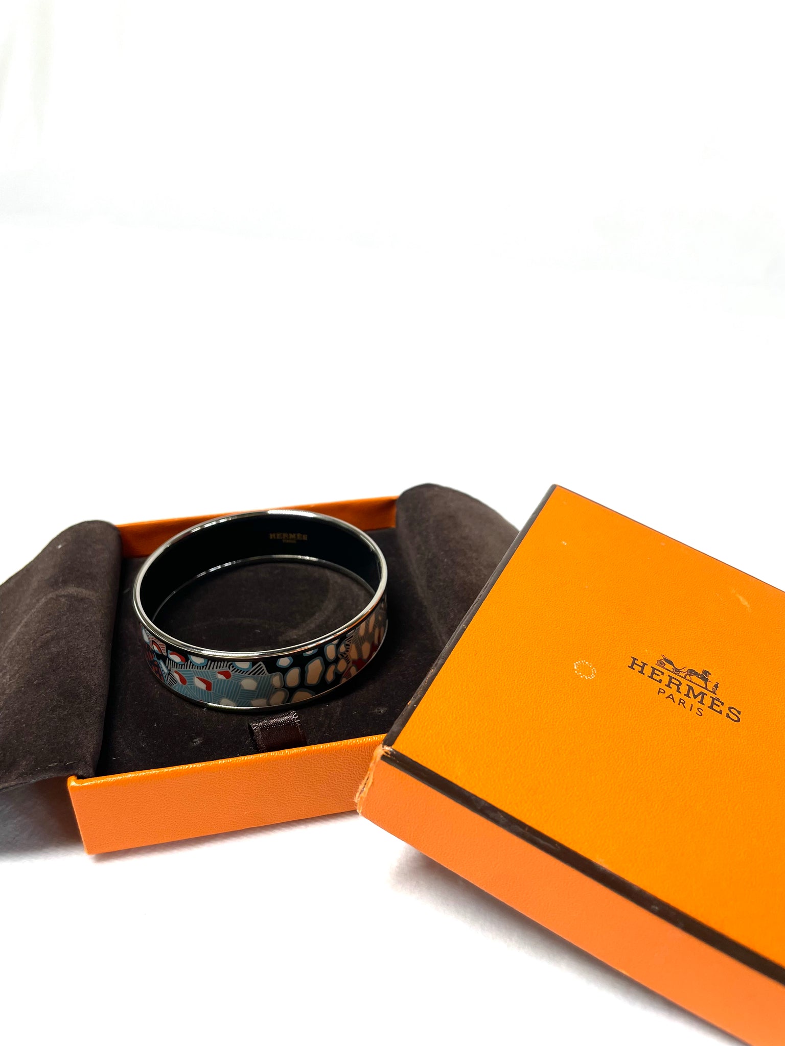 Pre Loved Hermes Animal Print Bangle in Silver available at UniKoncept in Waterloo
