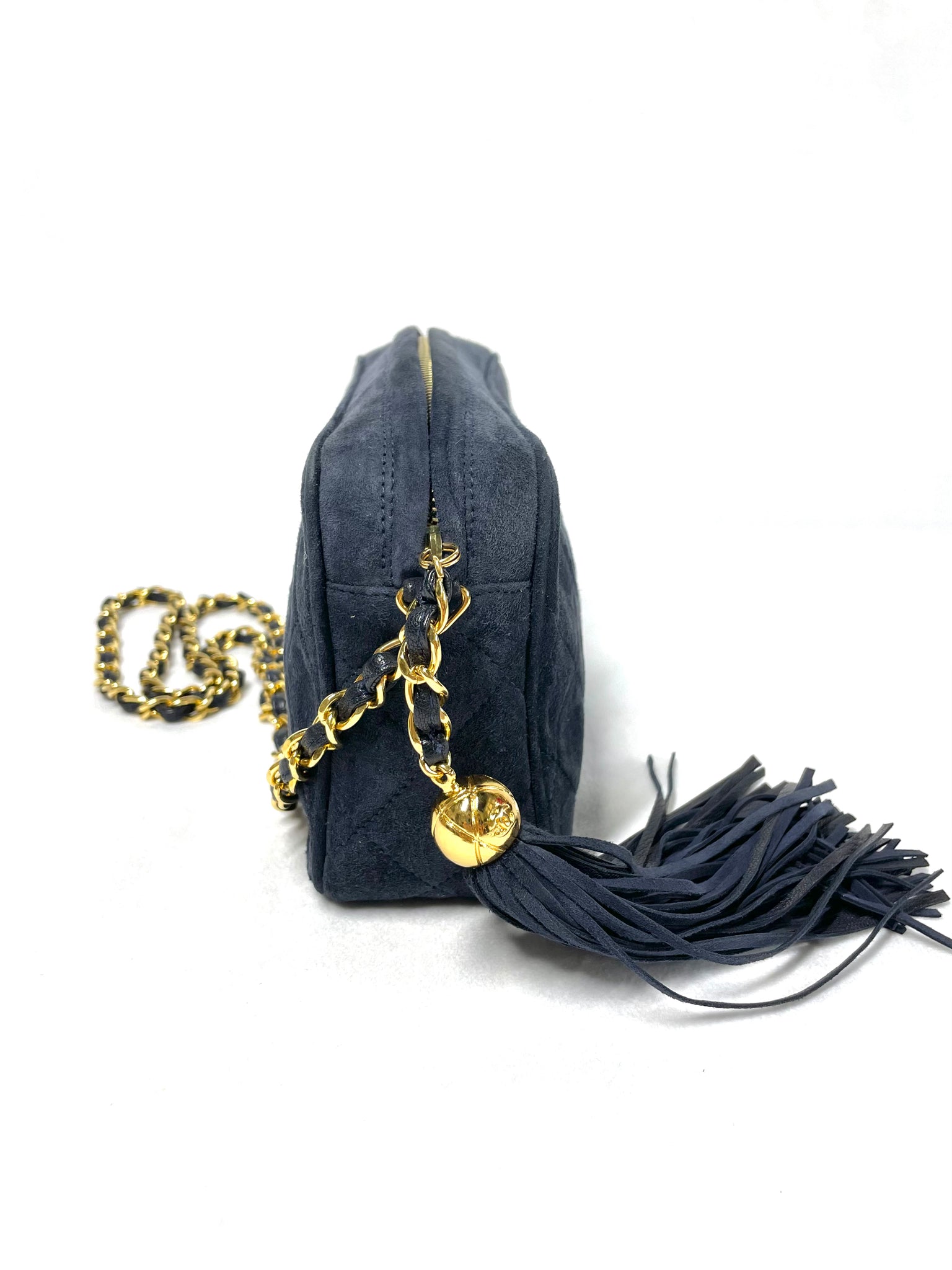 Photo of Chanel CC Matelasse Suede Fringe Tassel Navy Bag With Gold Hardware available at UniKoncept in Waterloo