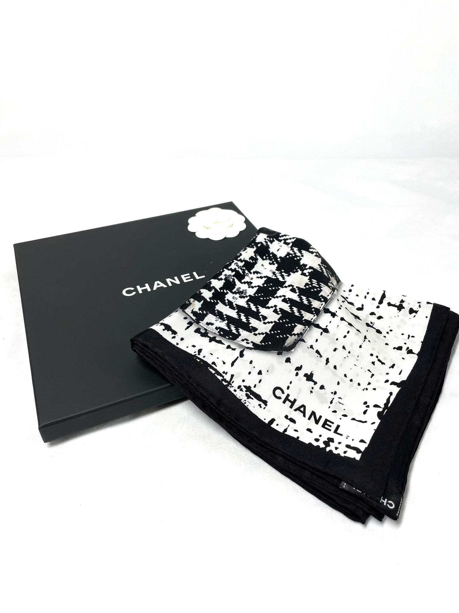 Photo of Chanel 100% Silk Scarf in Black and White Print available at UniKoncept in Waterloo