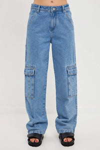 Front view of model wearing Baggy Cargo denim Featuring a straight leg, with large side cargo pockets and a baggy fit that sits mid-rise from Grey Labs available at UniKoncept in Waterloo