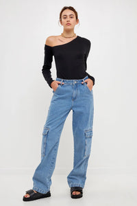 Front view of model wearing Baggy Cargo denim Featuring a straight leg, with large side cargo pockets and a baggy fit that sits mid-rise from Grey Labs available at UniKoncept in Waterloo