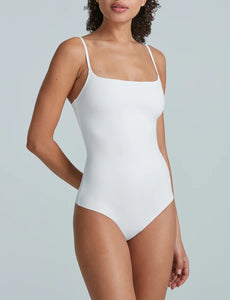 photo of model wearing neoprene cami bodysuit in white from Commando available at UniKoncept in Waterloo front view