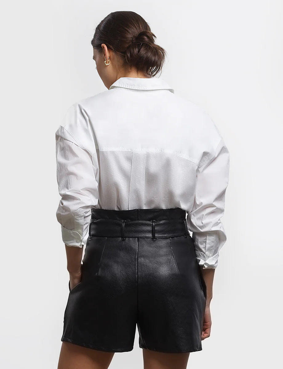 photo of model wearing Faux Leather Paper Bag Shorts in black with tie details from Commando available at UniKoncept in Waterloo