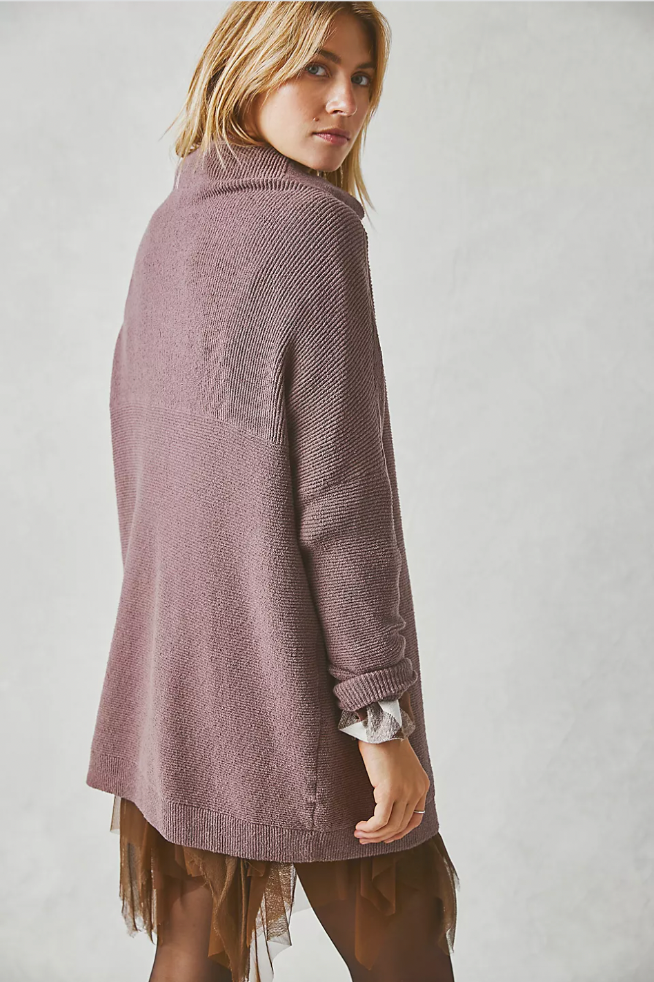Photo of model wearing Ottoman Slouchy Tunic in the colour Nutmeg from Free People available at UniKoncept in Waterloo