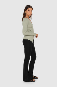 photo of model wearing Marley Knit Top in the colour sage available at UniKoncept in Waterloo side view