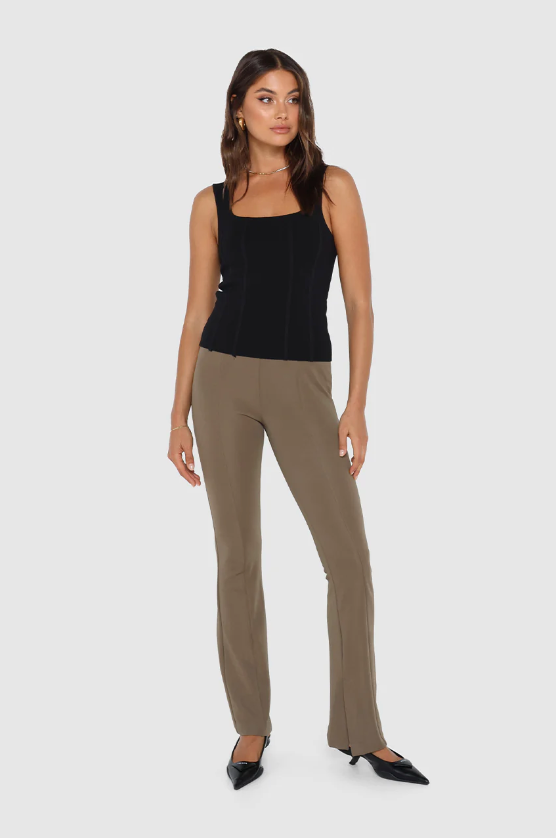 photo of model wearing Karla knit top in black available at UniKoncept in Waterloo