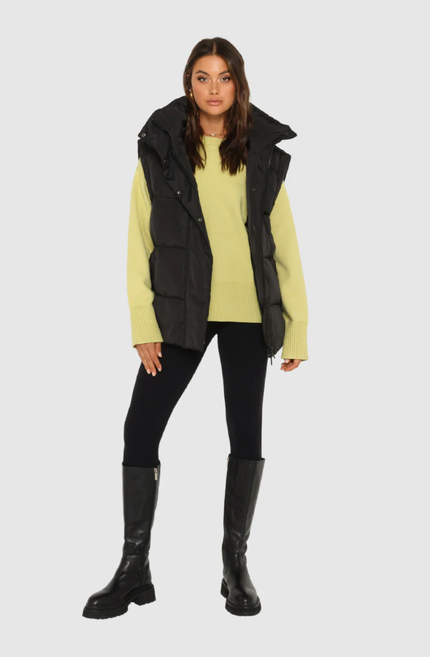 photo of model wearing jasper 3 in 1 puffer jacket in black available at UniKoncept in Waterloo front view as vest