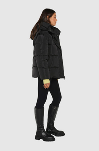photo of model wearing jasper 3 in 1 puffer jacket in black available at UniKoncept in Waterloo side view