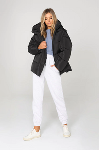 photo of model wearing jasper 3 in 1 puffer jacket in black available at UniKoncept in Waterloo front view