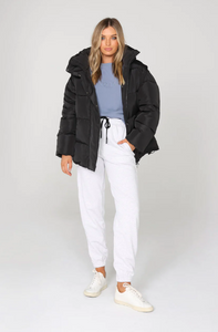 photo of model wearing jasper 3 in 1 puffer jacket in black available at UniKoncept in Waterloo front view