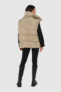 photo of model wearing jasper 3 in 1 puffer jacket in sage available at UniKoncept in Waterloo back view as vest