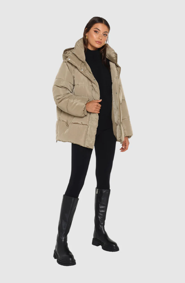 photo of model wearing jasper 3 in 1 puffer jacket in sage available at UniKoncept in Waterloo front view