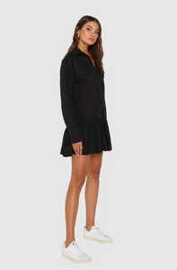 Kenna Shirt Dress in Black with buttons, ruffles, and pocket detailing from Madison The Label available at UniKoncept in Waterloo side view