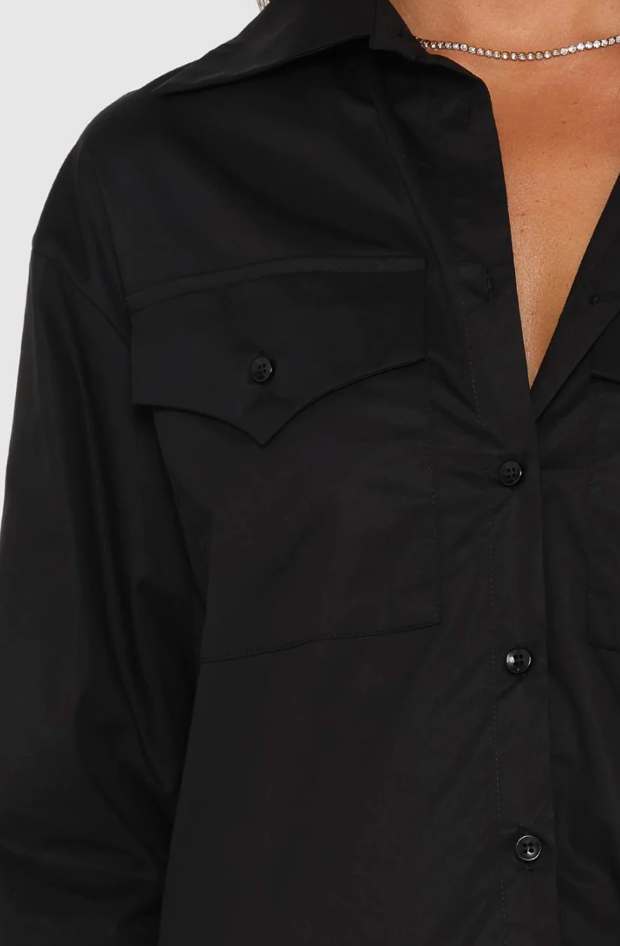 Kenna Shirt Dress in Black with buttons, ruffles, and pocket detailing from Madison The Label available at UniKoncept in Waterloo close up of details