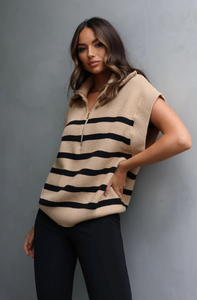 photo of model wearing owen knit vest in a camel colour with black stripes featuring a quarter zip available at UniKoncept in Waterloo