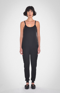 photo of model wearing the nicola jumpsuit in black from paper label available at UniKoncept in Waterloo front view