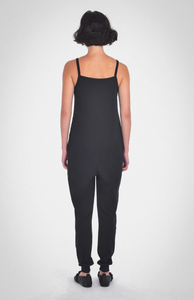 photo of model wearing the nicola jumpsuit in black from paper label available at UniKoncept in Waterloo back view