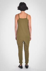 photo of model wearing the nicola jumpsuit in moss from paper label available at UniKoncept in Waterloo back view