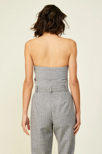 Photo of model wearing Paola Top in grey featuring a strapless neckline available at UniKoncept in Waterloo back view