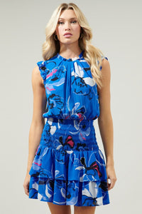 photo of model wearing Katrina dress in blue abstract print with dropped waist detailing available at UniKoncept in Waterloo front view