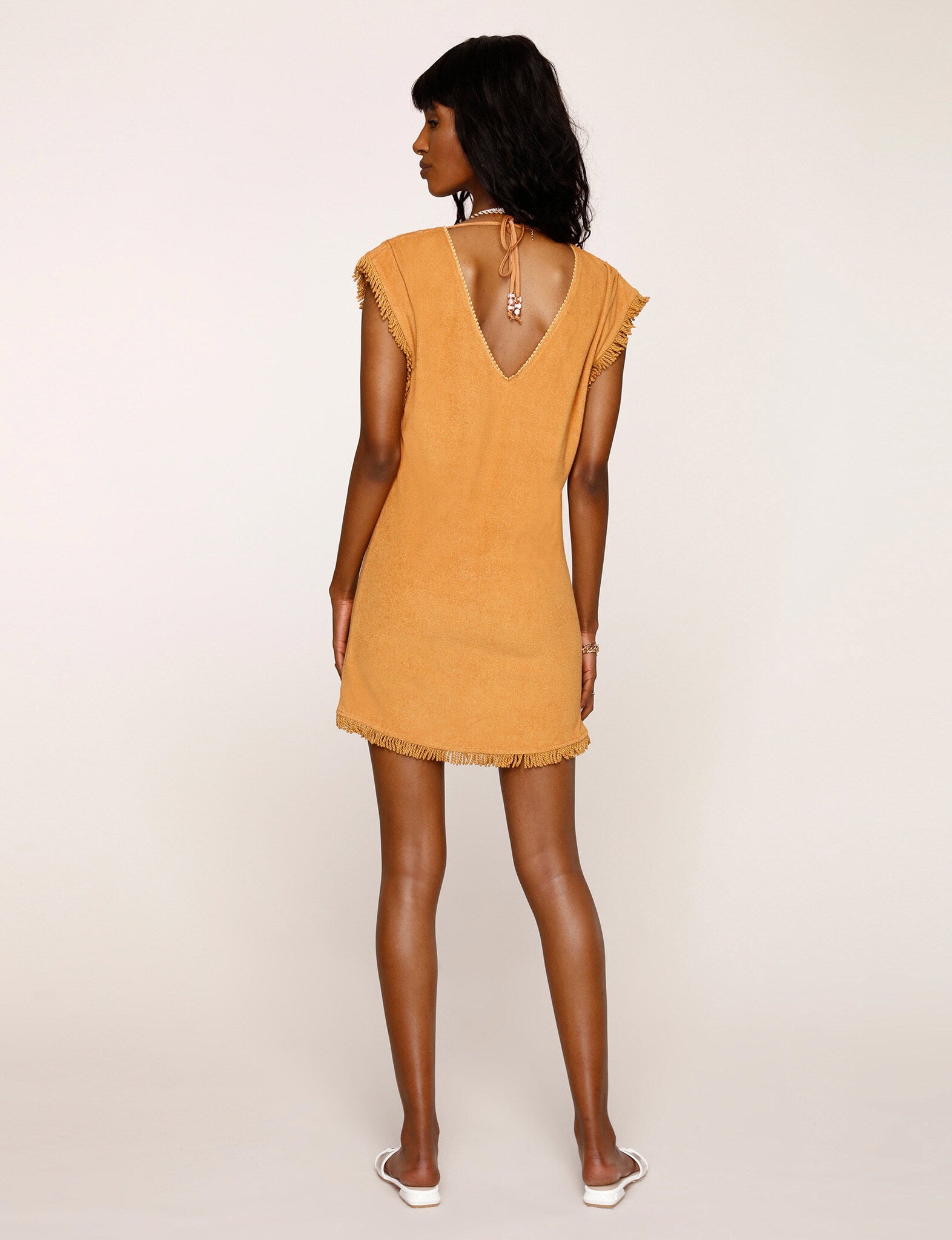 UNIKONCEPT Lifestyle Boutique and Lounge; Heartloom Heath Tunic in Golden pictured on a model