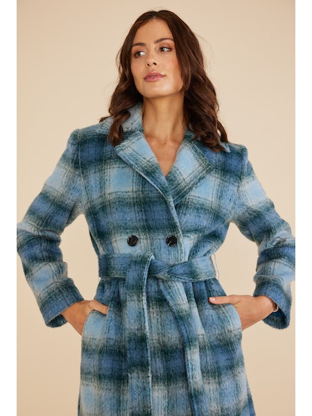 UNIKONCEPT Lifestyle Boutique and Lounge; Model wearing Sloan Coat in Navy Blue by MINK PINK
