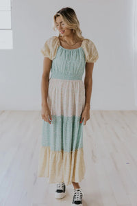 Model wearing Andalasia Patchwork Nursing Maxi in floral from Roolee available at UniKoncept in Waterloo