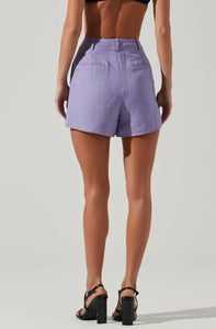 Model wearing Amiah High Waisted Shorts in purple from ASTR The Label available at UniKoncept in Waterloo photo of back view