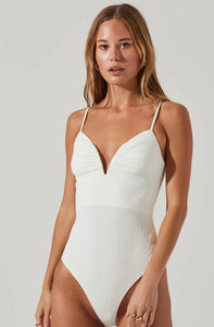 Model wearing Fia Crinkled Plunge Bodysuit in White from ASTR The Label available at UniKoncept in Waterloo