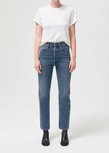 Model wearing Agolde 90's Pinch Waist Jeans in Portrait