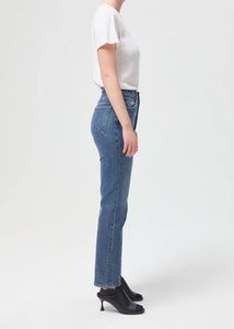 Model wearing Agolde 90's Pinch Waist Jeans in Portrait