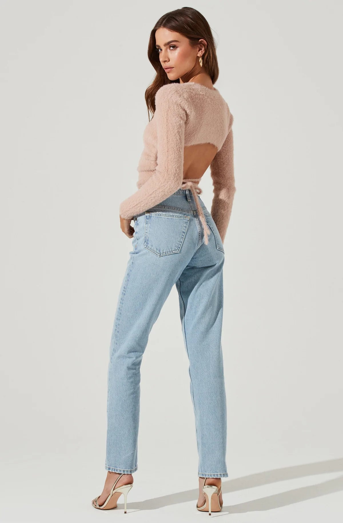 UNIKONCEPT Lifestyle Boutique and Lounge; Back Cut Out Tie Waist Sweater by ASTR The Label. A dusty pink textured sweater with an open back and tie-waist detail