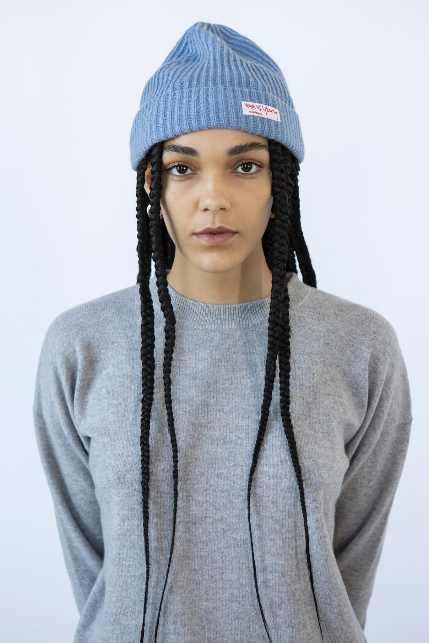UNIKONCEPT Lifestyle Boutique and Lounge; House of Liberty Cashmere Roxy Ribbed Beanie in colour Jean Blue featured on a model