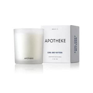 UNIKONCEPT Lifestyle Boutique and Lounge; Apotheke Earl Grey Bitters Candle. Hand-poured scented candle pictured with packaging on a white background.