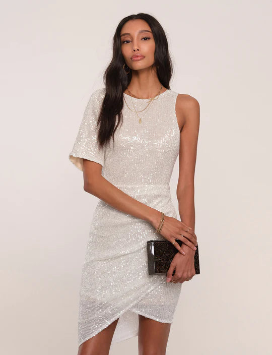 UNIKONCEPT Lifestyle Boutique and Lounge; Model wearing Heartloom Pomelo Dress in the colour "Ice": A white sequinned one-sleeve cocktail dress with asymmetrical hem.