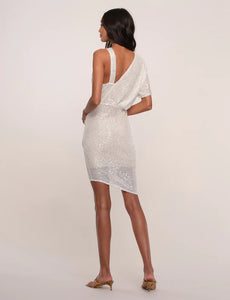 UNIKONCEPT Lifestyle Boutique and Lounge; Back view of model wearing Heartloom Pomelo Dress in the colour "Ice": A white sequinned one-sleeve cocktail dress with asymmetrical hem.