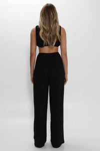 Model wearing Harvi Crop Top in Black from Lost in Lunar available at UniKoncept in Waterloo back view