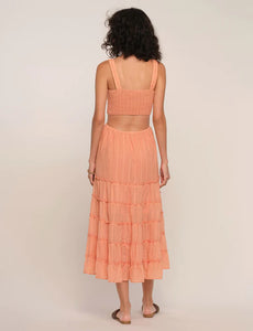 Model wearing Gracelyn dress by Heartloom in Melon