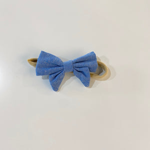 UNIKONCEPT Lifestyle Boutique and Lounge; Blue denim Baby Bow on a white background by UnikBaby