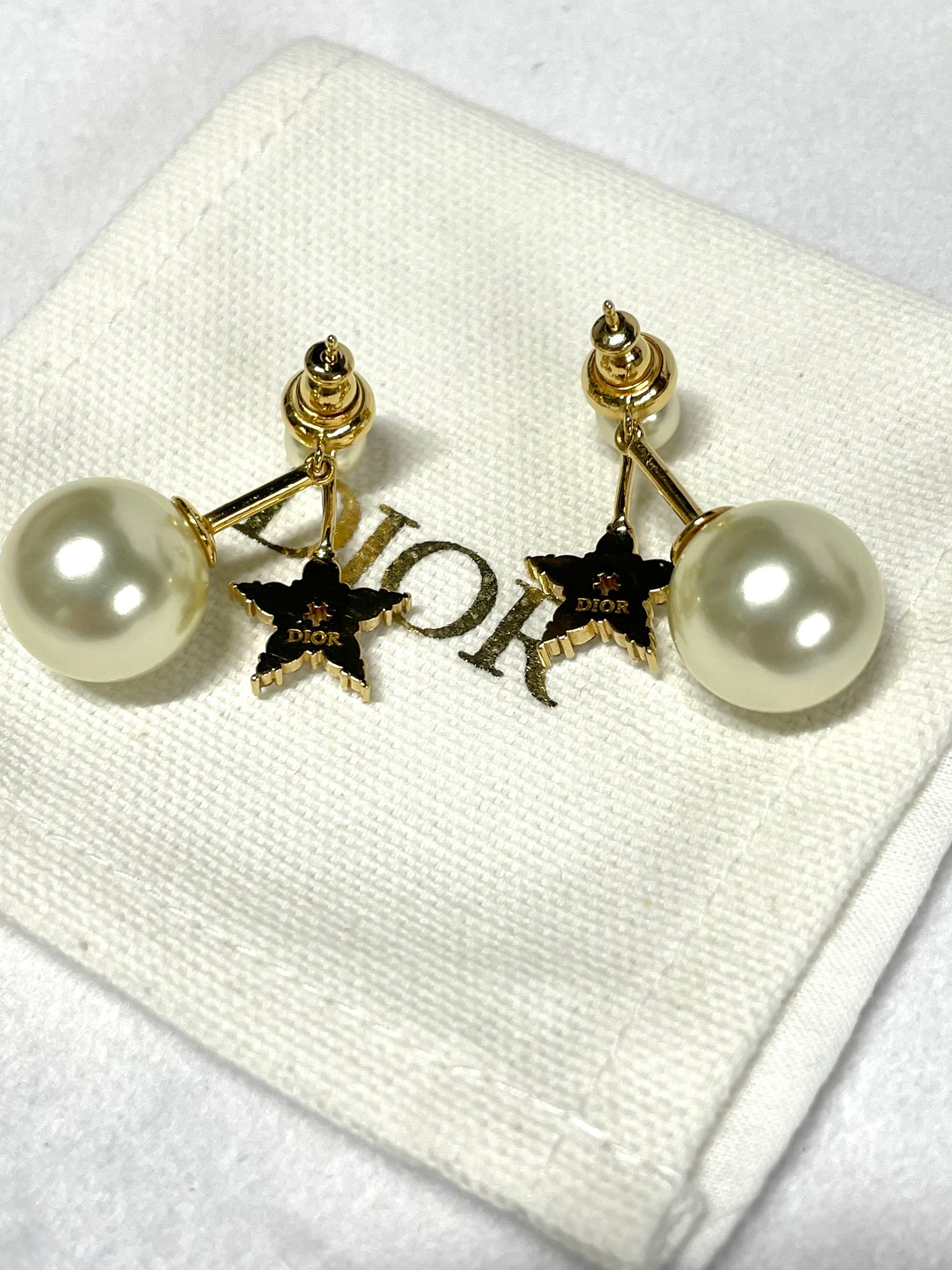 Pre Loved Dior 2 Tribal Lucky Star/ pearl studs *brand new* earrings from UniKoncept in Waterloo