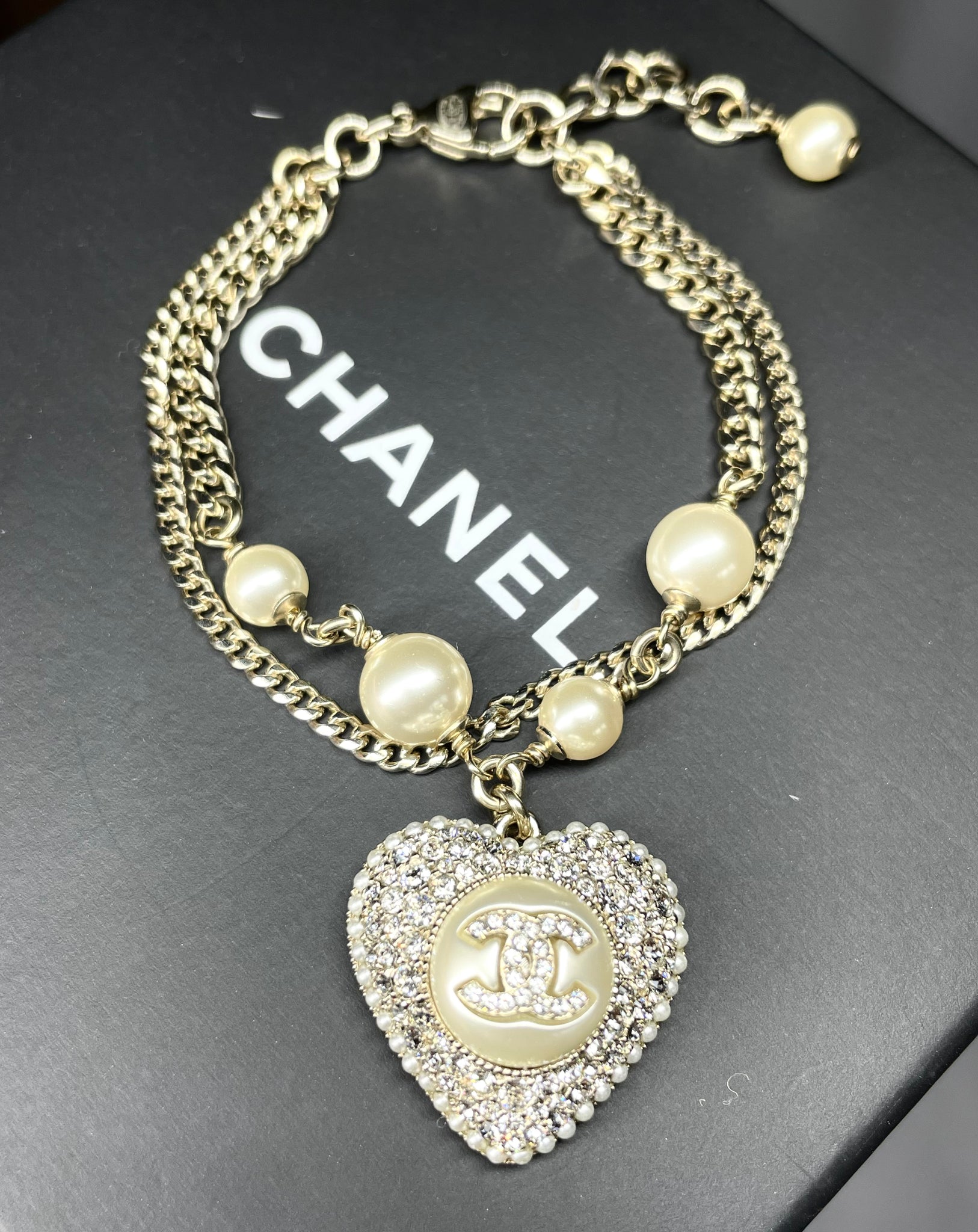 Pre Loved Chanel Crystal Pearl Heart Bracelet *brand new* from UniKoncept in Waterloo