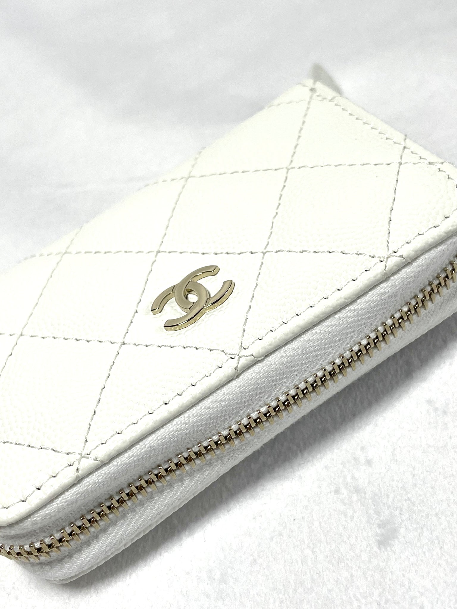 Pre Loved Chanel White Caviar Zip Wallet *brand new* from UniKoncept in Waterloo