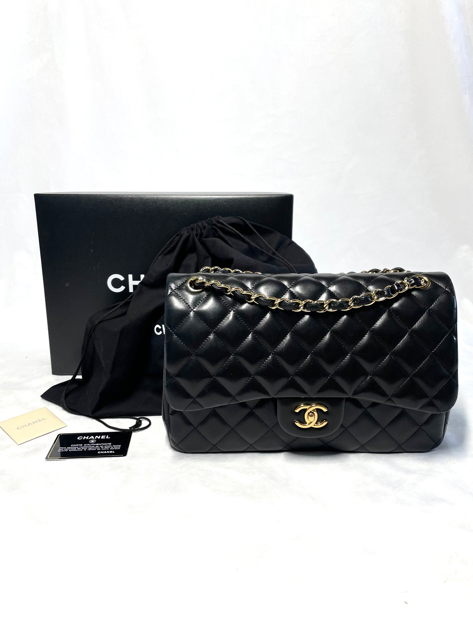 Pre Loved Chanel Classic Jumbo Double Flap Black Bag with Gold Hardware available at UniKoncept in Waterloo