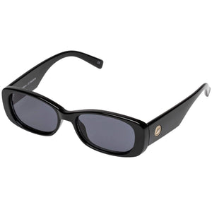 UNIKONCEPT Lifestyle Boutique and Lounge; Le Specs Unreal sunglasses in shiny black on a white background