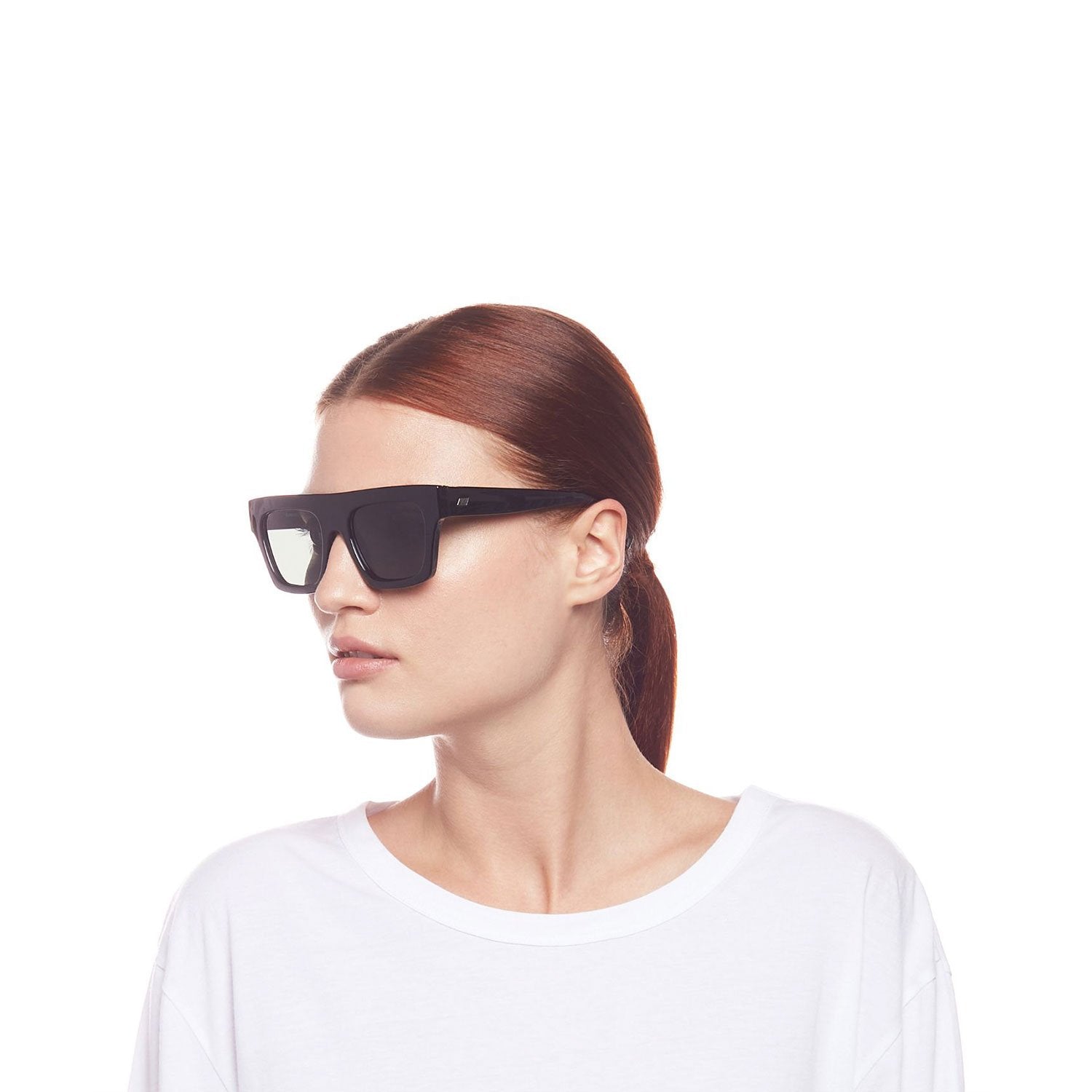 UNIKONCEPT Lifestyle Boutique and Lounge; Le Specs Subdimension sunglasses in Black on a model